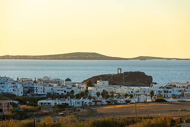 Sunset from Naxos island, Paros island in background, Cyclades, Greece.