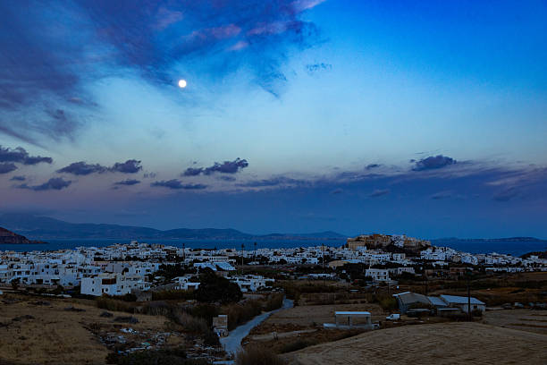 Night at Naxos island, Paros island in background, Cyclades, Greece.