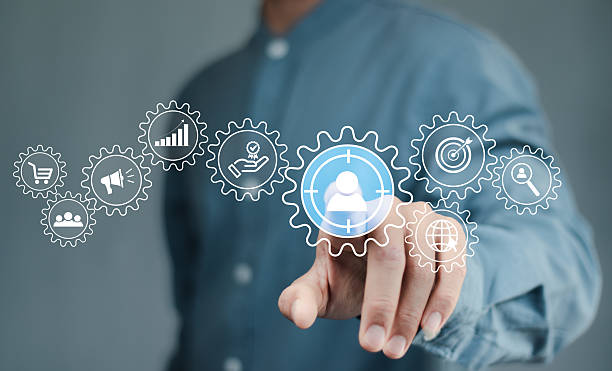 istock Digital marketing strategy and customer targeting concept. A person interacts with interface marketing and customer target icons, symbolizing strategic planning, audience engagement, business growth, 2217630947