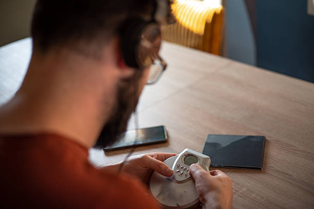 istock Retro vibes: remembering the 2000s with an old mini CD player and headphones 2217631424