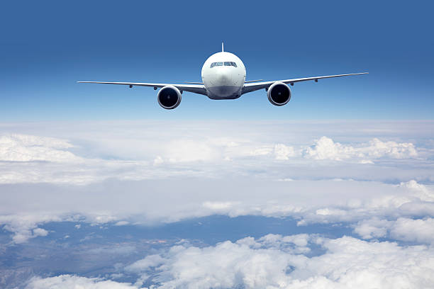 istock Passenger jet airplane flying above clouds 2217631518