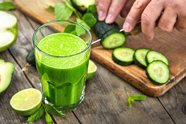 istock Fresh green smoothie on a wooden table 2217631821