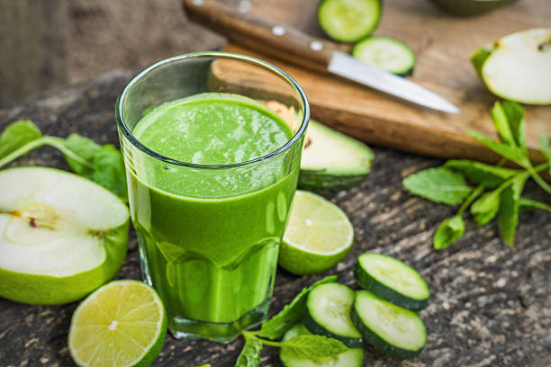 istock Fresh green smoothie on a wooden table 2217631829