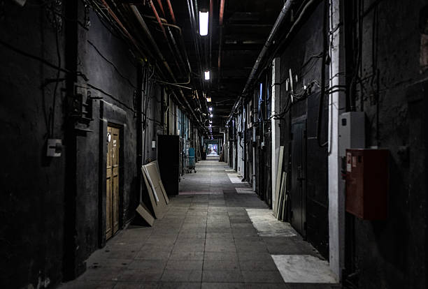 istock Dimly lit industrial corridor with an ominous atmosphere 2217651654