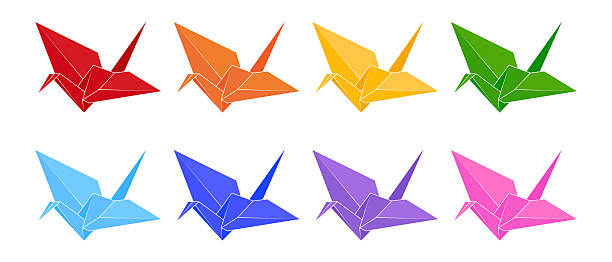 istock Multicolored paper cranes set. Paper cranes in rainbow colors. Origami flying bird symbol. Vector illustration 2217654418