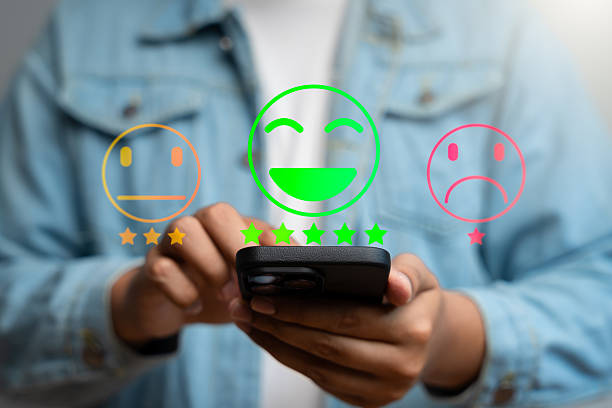 istock Happy customer providing 5-star review via mobile application after receiving outstanding service and quality product. Online customer feedback plays crucial role in business ranking, Consumer trust 2217654861