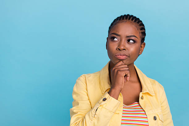 istock Portrait of attractive skeptic doubtful girl overthinking solution copy space isolated over vibrant blue color background 2217656593