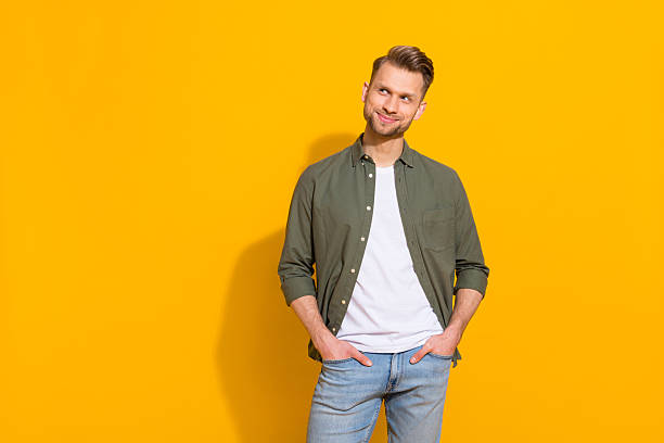 istock Portrait of attractive cheery minded sly guy making decision copy space ad isolated over vibrant yellow color background 2217657939