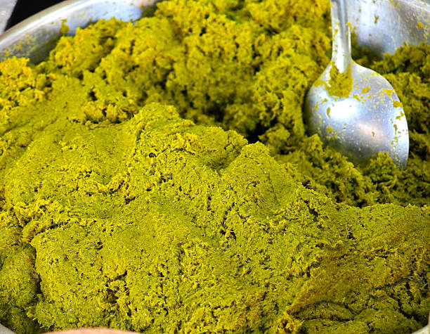 istock Fresh made red curry paste. Traditional thai market. 2217657971
