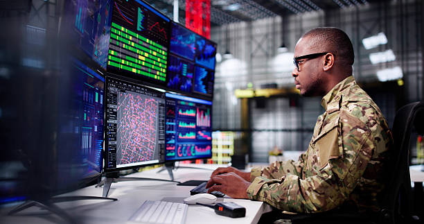 istock Strategic Rocket Facility Operations: African American Engineer Monitoring 2217660222