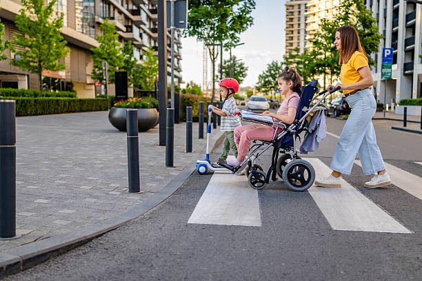 istock Siblings Crossing with Mom at Crosswalk 2217660581