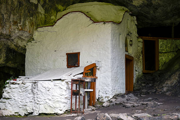 Orthodox monastery enclosed by Davelis cave in Penteli, a mountain to the north of Athens, Greece.