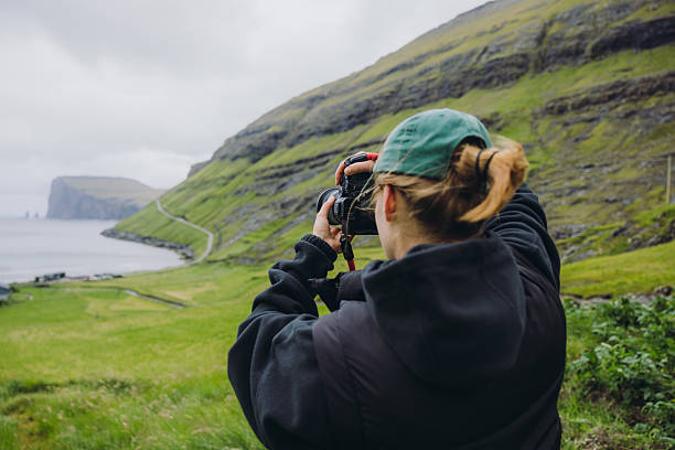 istock Traveller Capturing Pure Nature of Faroe Islands 2217674013