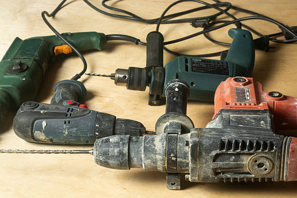 istock Used power tool for drilling holes in various materials. Drill, screwdriver, punch. 2217674172