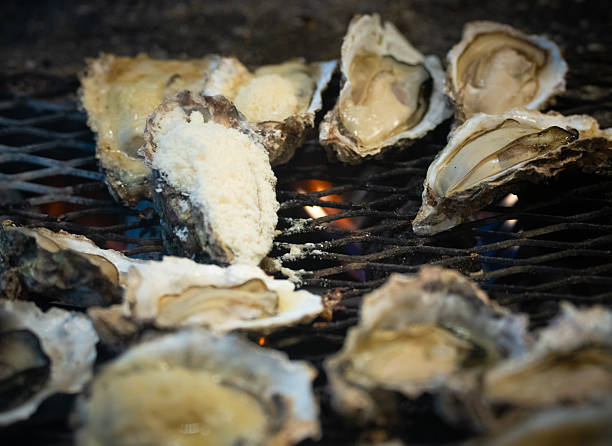 istock Grilled Oysters with Cheese on Open Flame 2217681147
