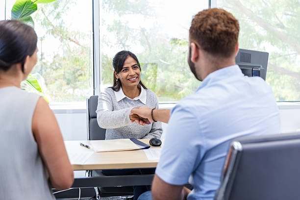 istock Businesswoman shaking hands, successful meeting,  office interior 2217681380