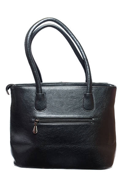 istock Women black brown bag isolated 2217684868
