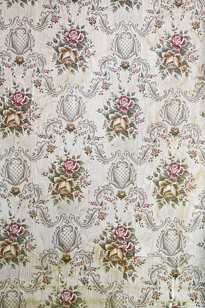 istock Old wallpaper on the wall. Old wallpaper for texture or background. 2217688331