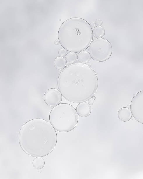 istock Transparent skincare serum texture with air bubbles on light background 2217688422