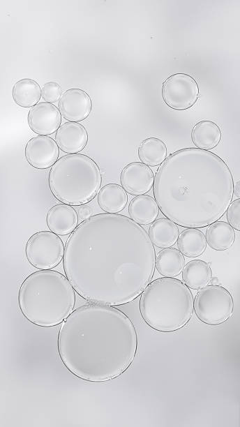 istock Transparent skincare serum texture with air bubbles on light background 2217688423