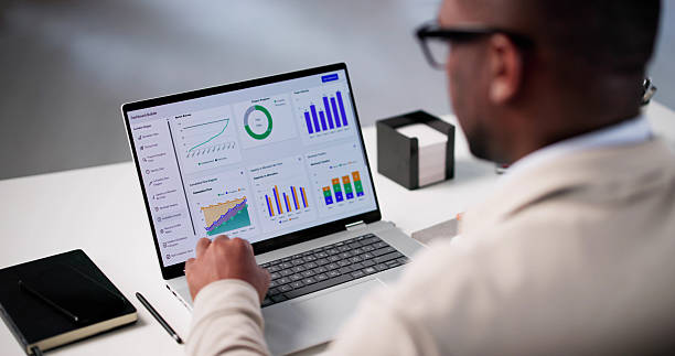 istock Analyzing Market Trends: Young African American Data Analyst 2217689957