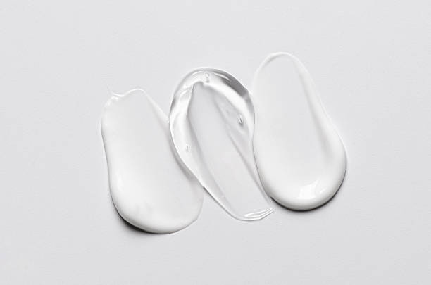 istock A sample of white and transparent cosmetic cream 2217695049