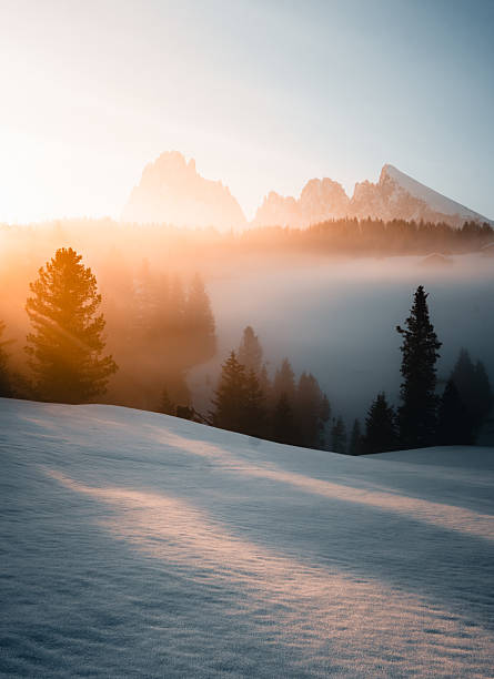 Sunrise over snowcapped mountain pinnacles, Dolomites