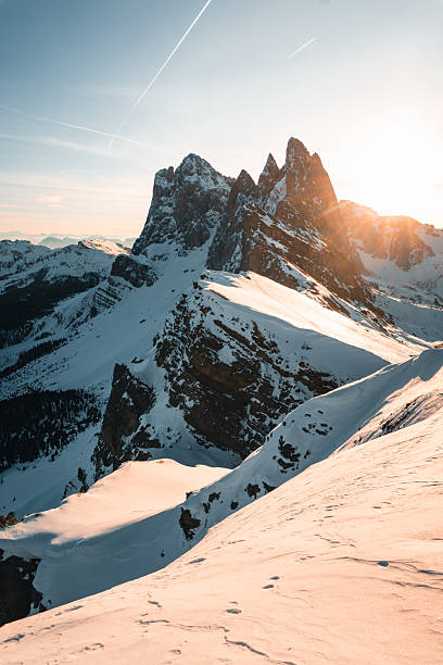 istock Sunrise over snowcapped mountain pinnacles 2217696173