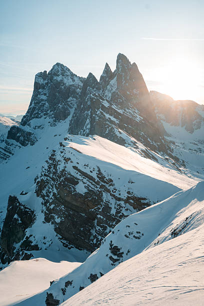 istock Sunrise over snowcapped mountain pinnacles 2217696176