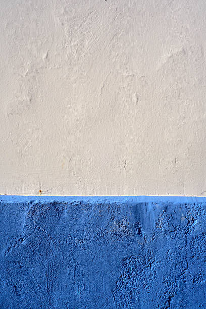 istock Blue and white stucco rustic wall detail 2217697753