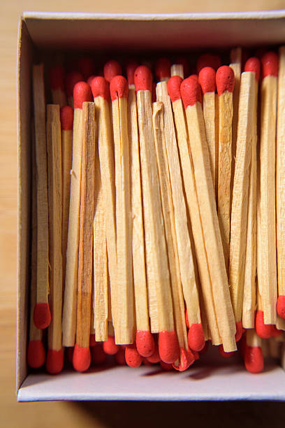 istock Red match sticks in matchbox detail 2217698710