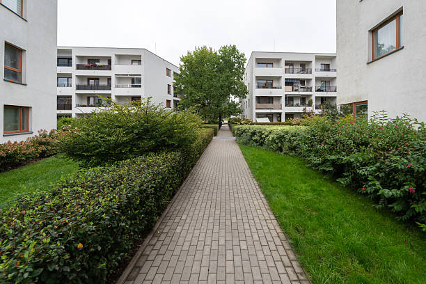 istock Landscaped Pathway in Modern European Residential Complex Courtyard 2217700280