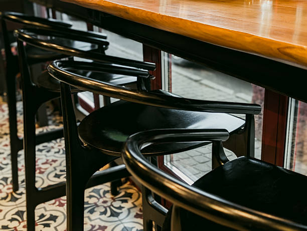 istock stylish coffee shop interior with black high stools 2217701599