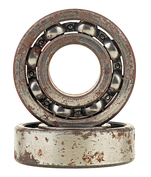 istock Old and rusty ball bearings isolated on a white background. Roller bearings. 2217702873