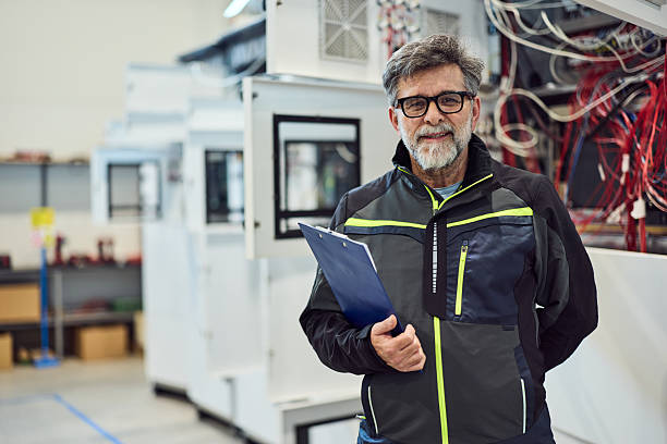 istock Engineer Inspecting Industrial Equipment in a Modern Technological Facility 2217709518