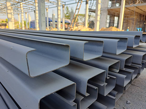 istock C channel steel or Light-edged channel steel for construction.  C-shaped steel structure.Stacked of Steel Angled Bar 2217709828