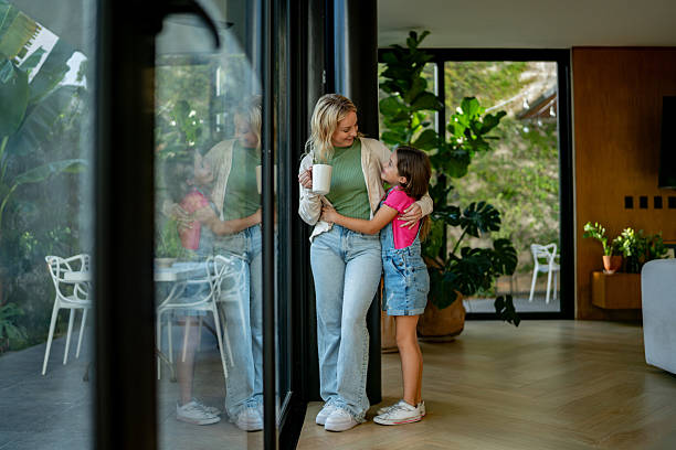 istock Mother and daughter talking embraced at home 2217711538