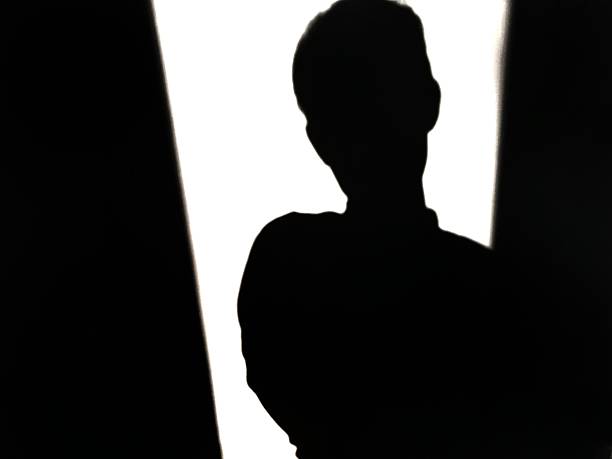 istock Silhouette shadow of a man 2217714271