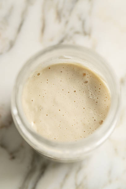 istock glass jar of sourdough starter 2217720157