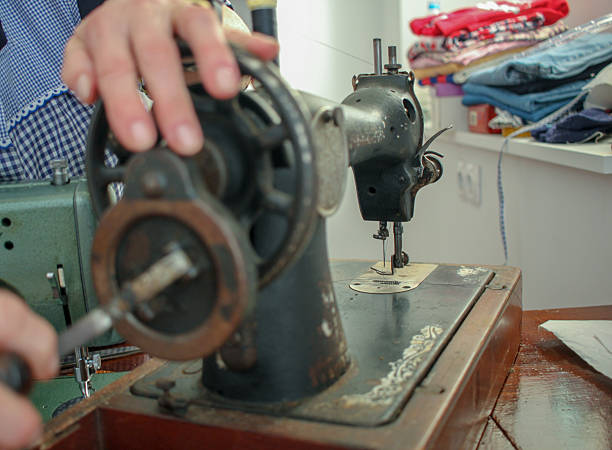 istock old woman passing time with a sewing machine 2217722766