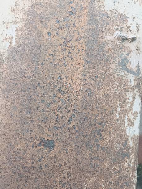 istock The abstract pattern of rust on a weathered metal plate creates an earthy texture. 2217722951