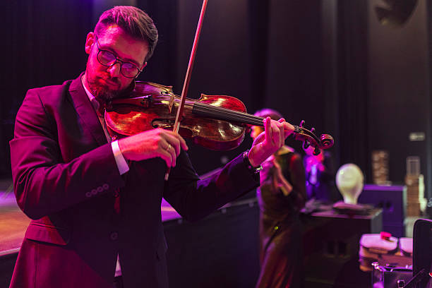 istock String quartet preparations before the start of a classical music concert 2217726378