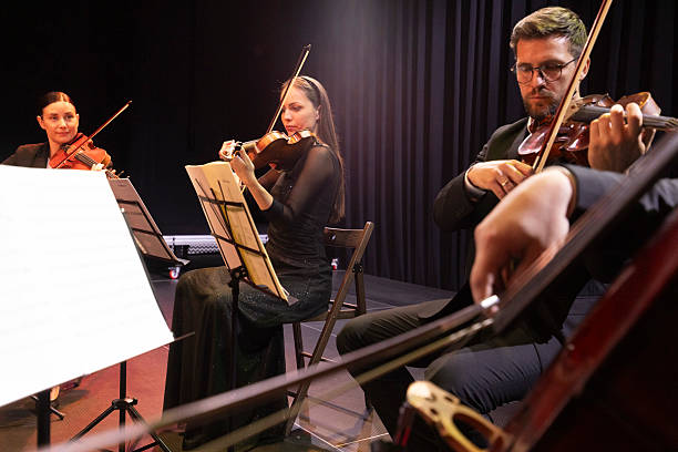 istock Four professional string players give a concert on stage 2217726410