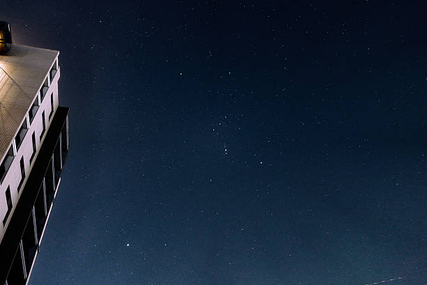 istock Orion shining in the city's night sky 2217733689