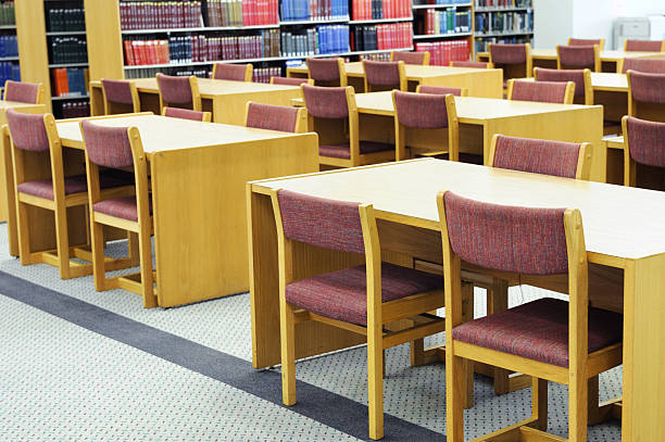 istock interior view of library with tables and chairs in university 2217742728