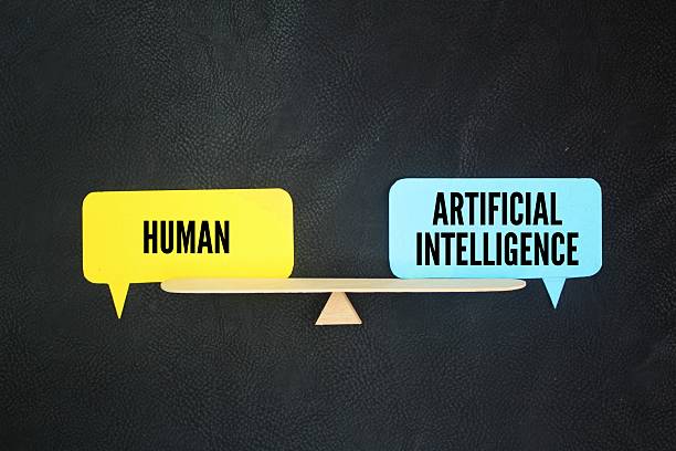 istock the balance between the words human vs. artificial intelligence. The balance between humans and AI. Create art generate content impact. 2217742738