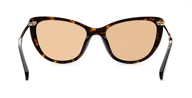 istock Sunglasses back view isolated on white background. Leopard color eyeglasses cat eye frame with yellow gold uv lens against sunlight on vacation. Glasses vintage shape rear view retro style for design template and poster for sale or marketing. Fashion 2217750395