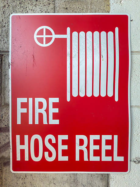 istock An old Fire Hose Reel sign on a wall 2217751672