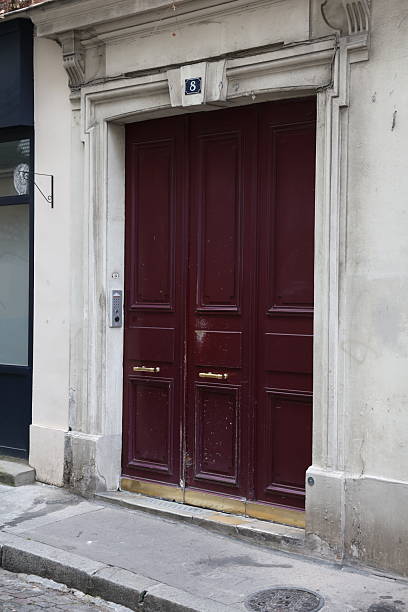 istock Classic Parisian Maroon Doorway Number 8 with Stone Frame and Intercom 2217757296