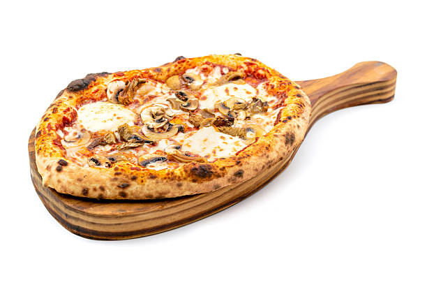 istock Cheese and mushroom pizza with toppings on the cutting board 2217757312